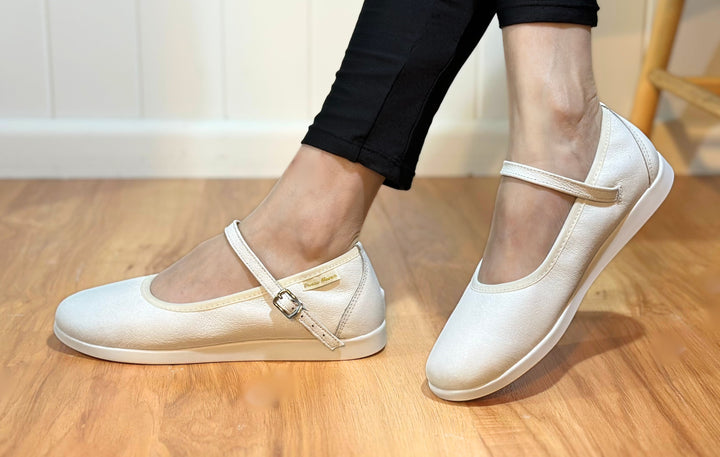 Premium women dance flat in white leather with raised dual pivot point spin spots outsole