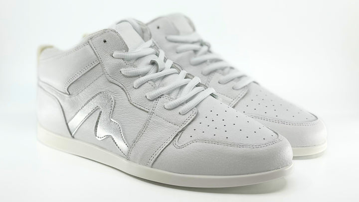 Premium women's high top dance sneaker in white leather featuring raised duo pivot spin spots out sole