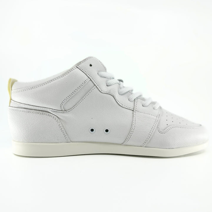 Premium women's high top dance sneaker in white leather featuring raised duo pivot spin spots out sole