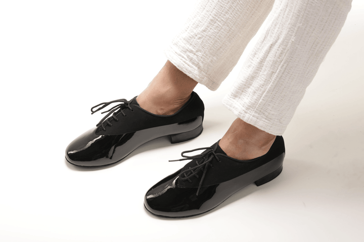 Premium men's high performance dance shoes in black patent and black nubuck