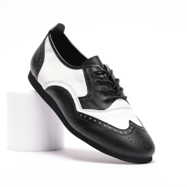 Premium Men's Brogue wingtip dance sneaker in black and white leather with smooth rubber sole