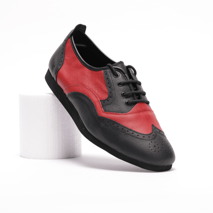 Premium men's brogue wingtip rock and roll dance sneaker in black and red leather