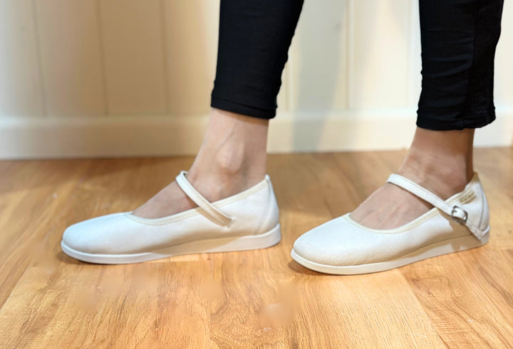 Premium women dance flat in white leather with raised dual pivot point spin spots outsole