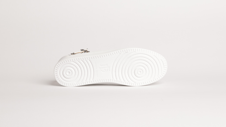 Premium women dance flat in white leather with raised dual pivot point spin spots outsole