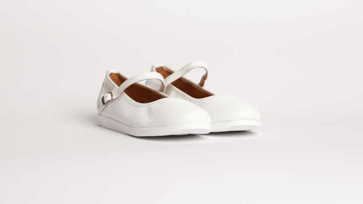 Premium women dance flat in white leather with raised dual pivot point spin spots outsole