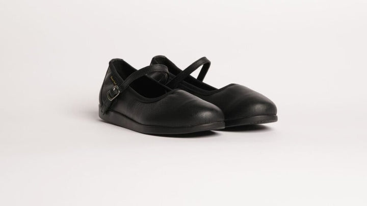 Premium women's rock and roll dance shoes in black leather with raised dual spin spots outsole
