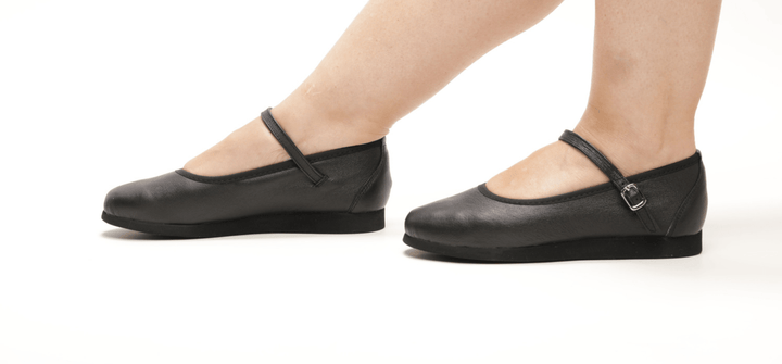 Premium women's rock and roll dance flats in black soft leather with smooth rubber sole
