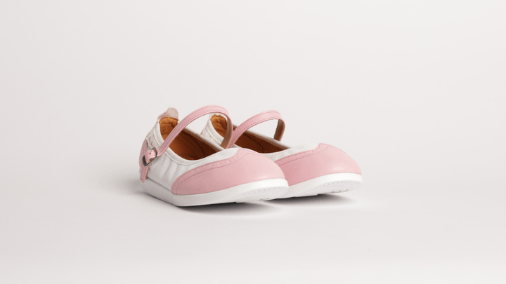 Premium women's rock and roll dance shoes in pink and white leather wingtip design with raised dual spin spots smooth outsole